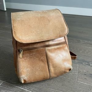 vintage tan leather backpack